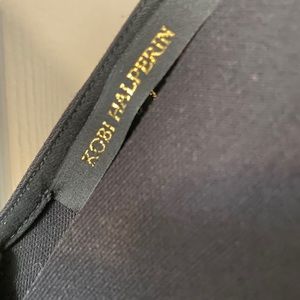 Empire waist stretch low V neck dress.